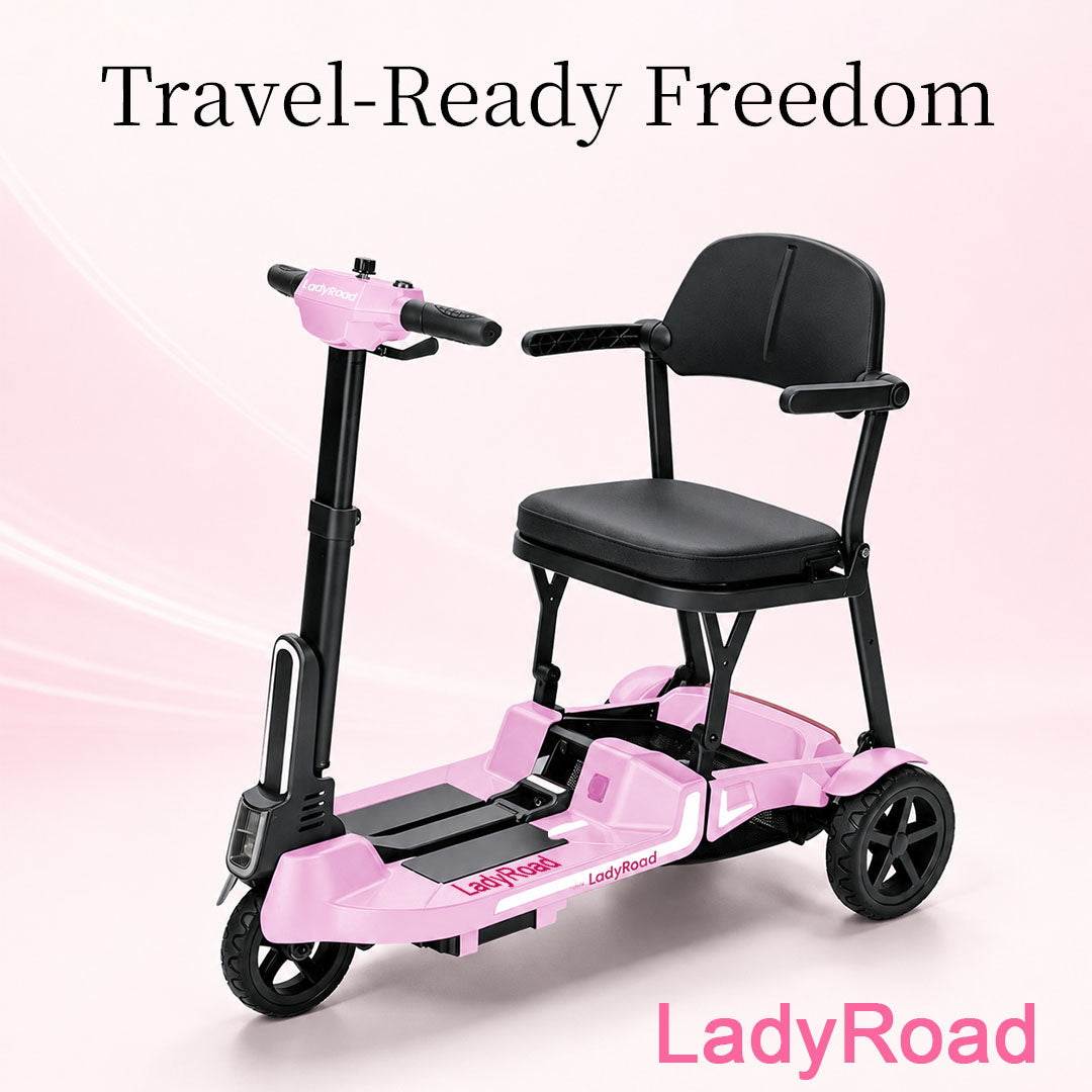 Pink LadyRoad travel mobility scooter with black seat and handlebars, shown on a pale pink background beneath “Travel-Ready Freedom.”